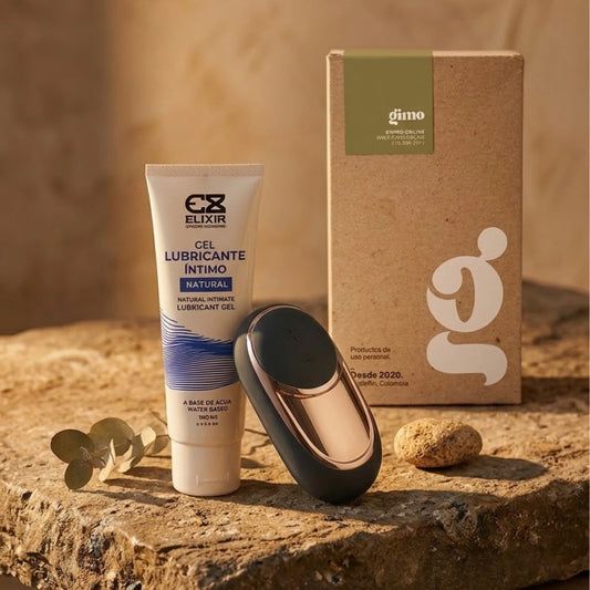 Presentación del kit Pleasure Explorer incluyendo el vibrador Satisfyer Dark, el lubricante neutro Elixir y empaque Gimo.