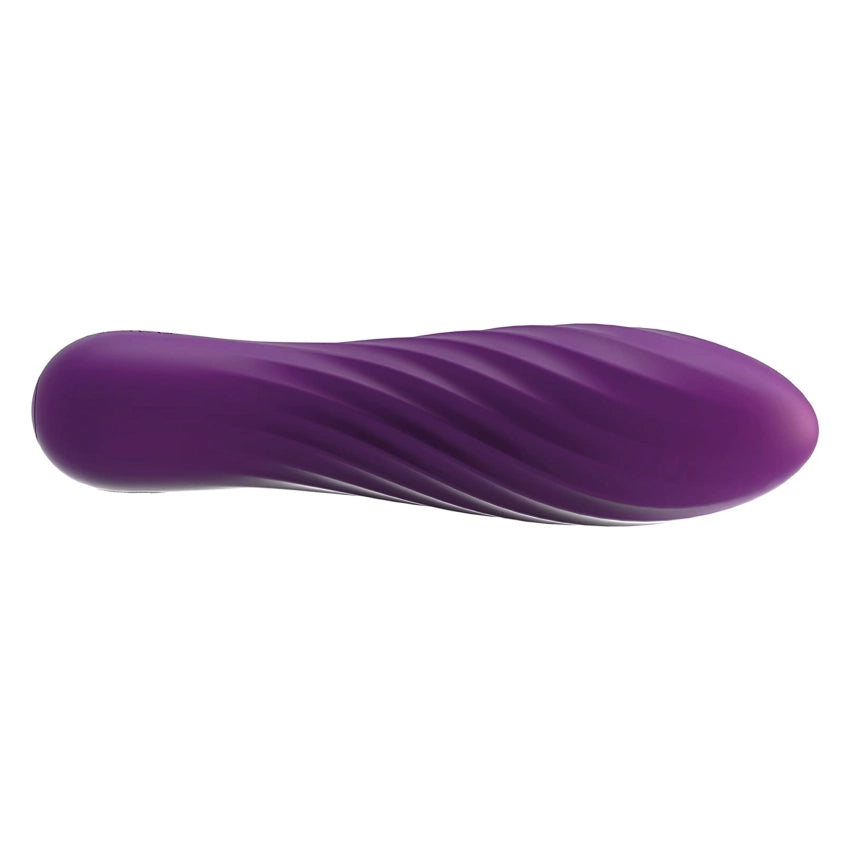 Detalle de la superficie con relieve en espiral del masajeador Tulip morado.